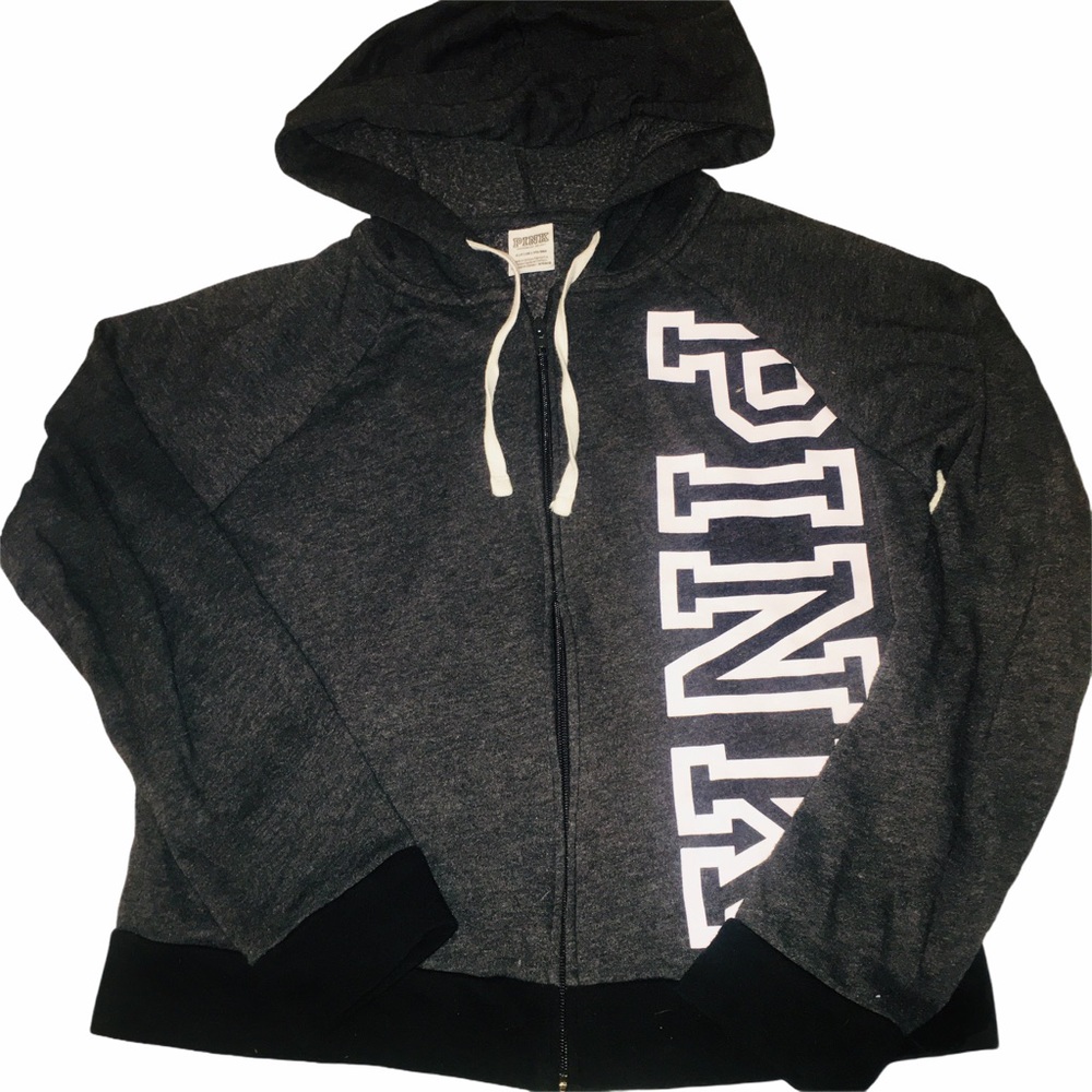 Small Pink zip up jacket.